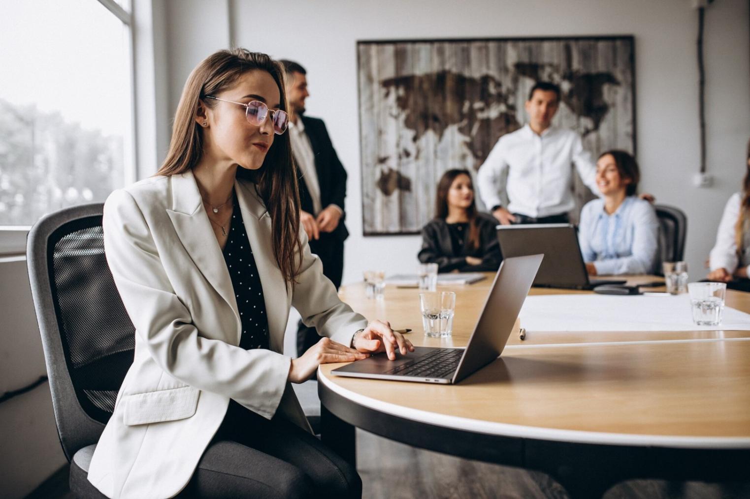 Students collaborating on web design projects in our modern learning space